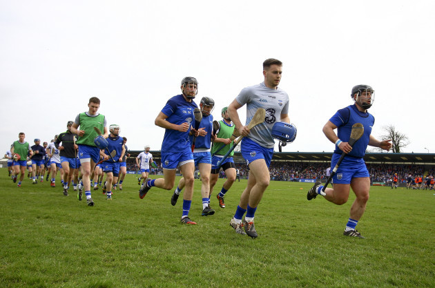 The Waterford team return to the dressing rooms after warming up
