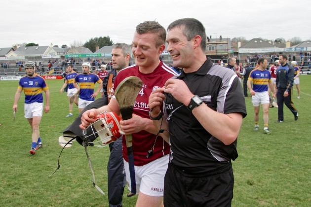 Joe Canning with referee James Owens after the game