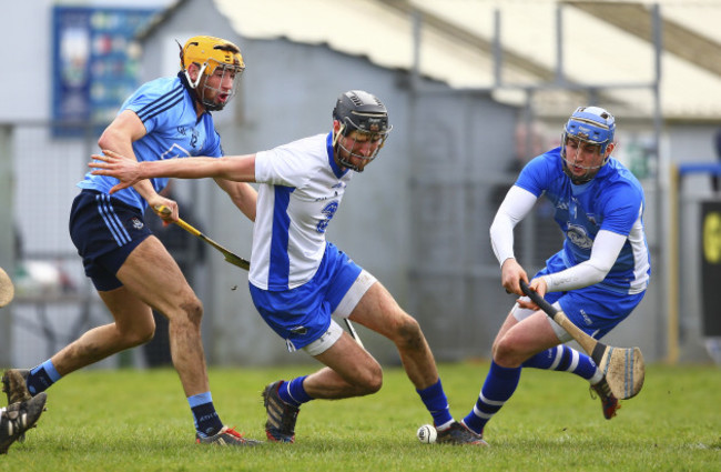 Stephen O&Otilde;Keeffe and Shane Fives tries to clear under pressure from Eamon Dillon