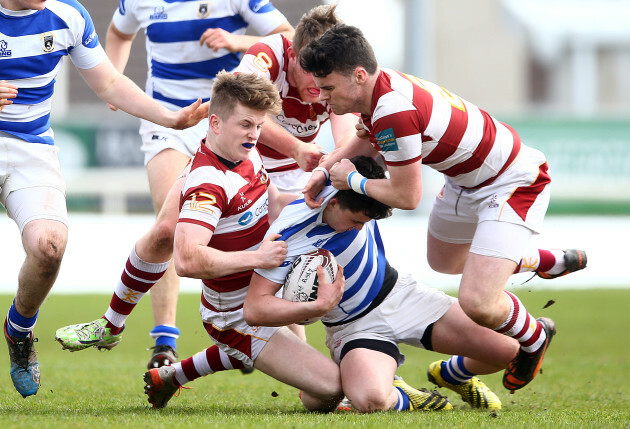 James Hill, Jake Gallagher and Conal Fallon tackle Frank Hopkins