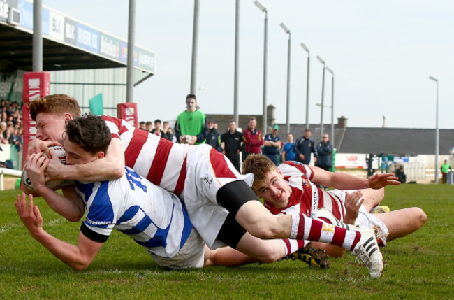 Frank Hopkins scores a try despite David Molloy and Morgan Codyre