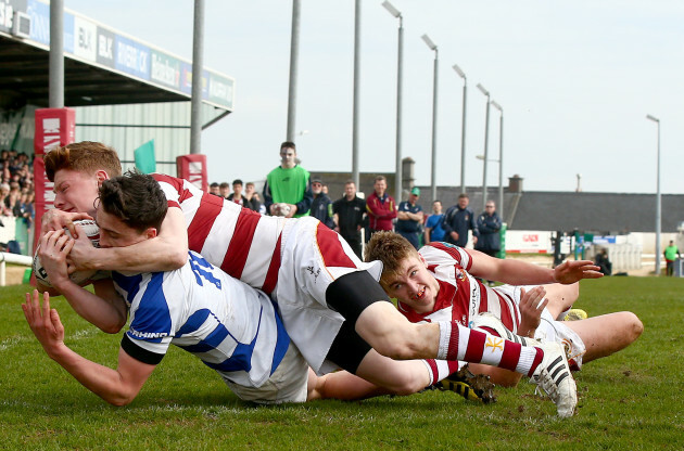 Frank Hopkins scores a try despite David Molloy and Morgan Codyre