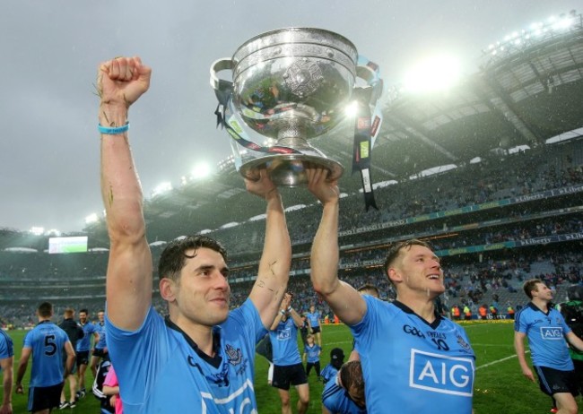 Bernard Brogan and Paul Flynn celebrates with the Sam Maguire trophy