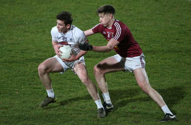 Con Kavanagh is tackled by Gavin Delaney