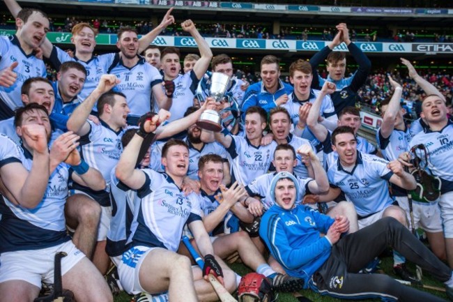 Na Piarsaigh players celebrate with the cup