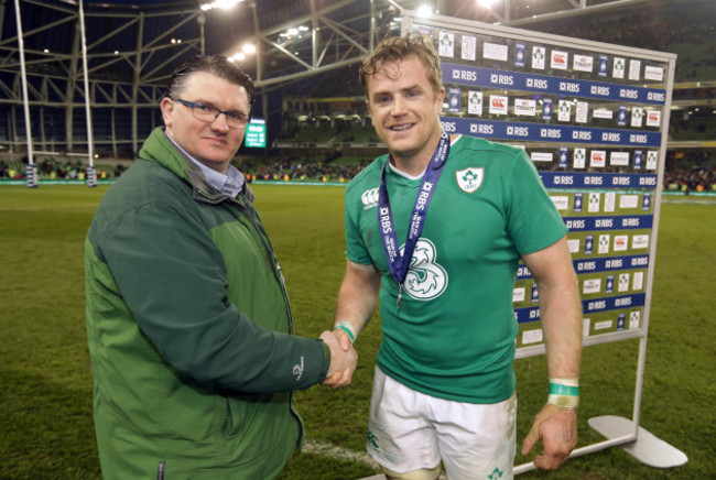 Jamie Heaslip is presented with the RBS Man of the Match award by Joe O' Mahony