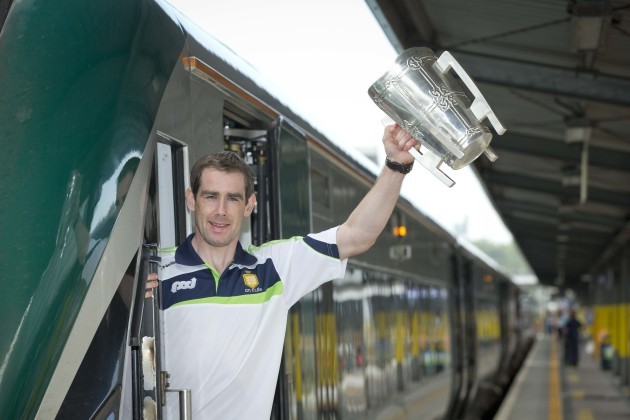 Pat Donnellan with the Liam McCarthy cup as the train prepares to leave Heuston station 29/9/2013