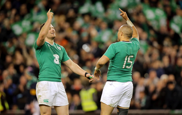 Simon Zebo and Robbie Henshaw celebrate the end of the game
