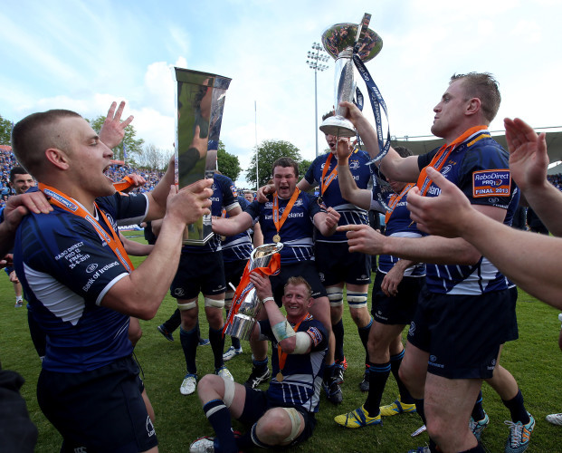 Ian Madigan, Leo Cullen and Jamie Heaslip celebrate with all three trophies
