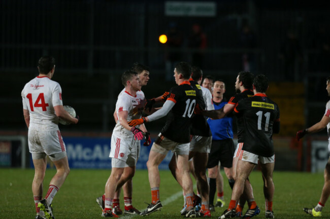The two teams scuffle as Colm Cavanagh is carded