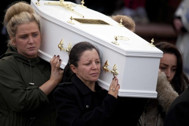 24/3/2016. Buncrana Drownings. Louise James (front left)carries the coffin of one of her two children, Evan and Mark from the Church of the Holy Family in Derry, afer the funeral service. Ms. James also lost her partner Sean McGrotty, her sister Jody-Lee