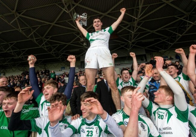 Josh Ryan celebrates with the trophy