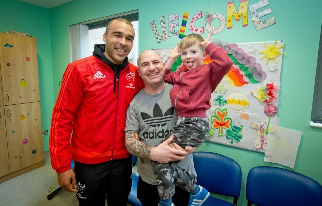 5 year old Liam Jennings and his father Dave with Simon Zebo