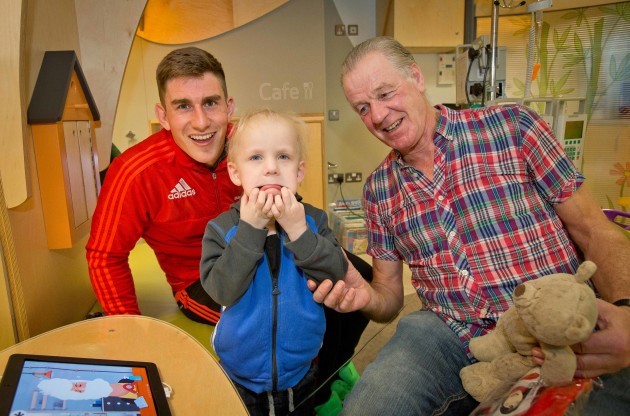 Ian Keatley with 3 year old Scott Kinsella and his grandfather Tom Fitzpatrick