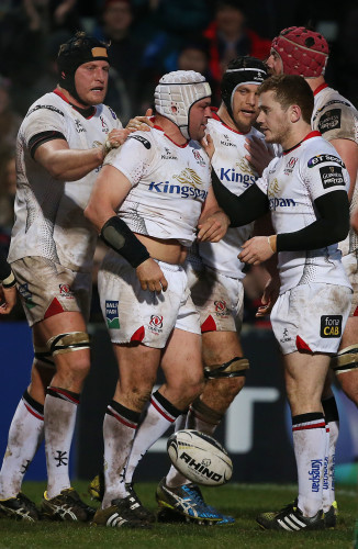 Rory Best celebrates scoring a try with teammates