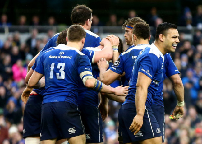 Johnny Sexton is congratulated by teammates