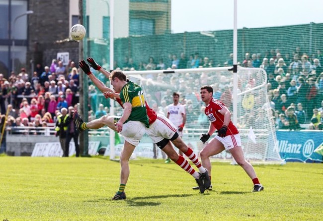 Fionn Fitzgerald scores a point