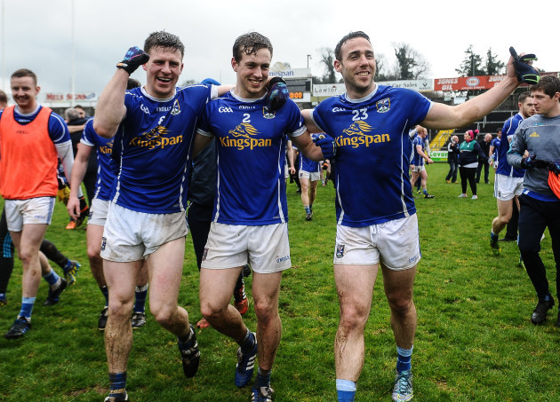 Tomas Corr, Padraig Faulkner and Eugene Keating celebrate at the end of the game