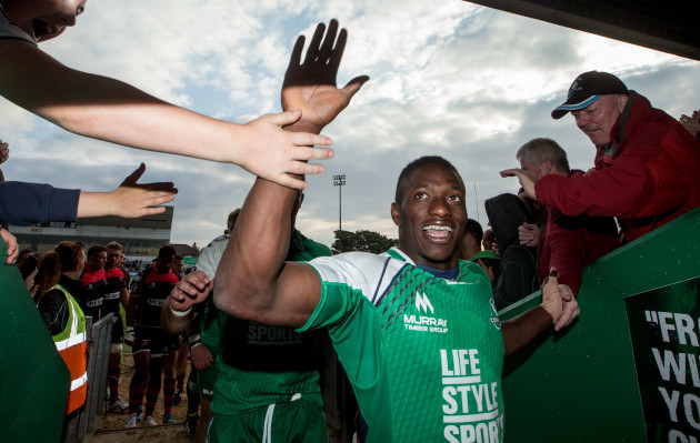 Niyi Adeolokun celebrates after the game