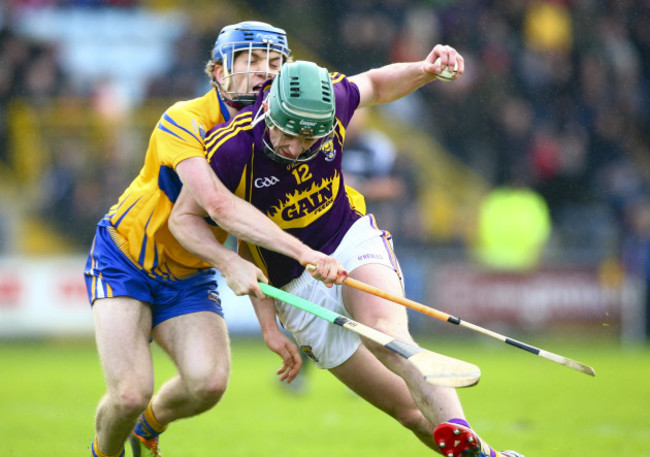 Harry Kehoe is tackled by Shane O'Donnell