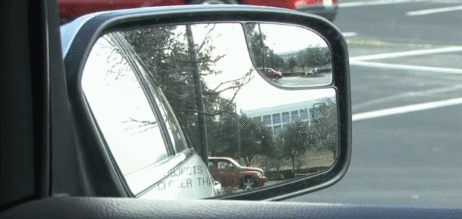 GIF showing how to adjust your wing mirrors