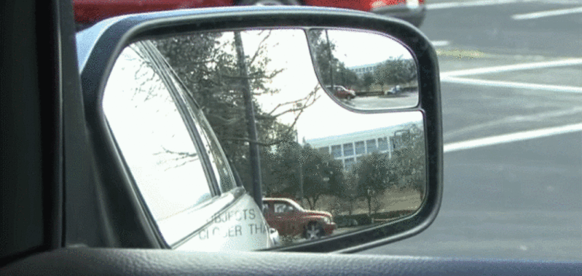 GIF showing how to adjust your wing mirrors