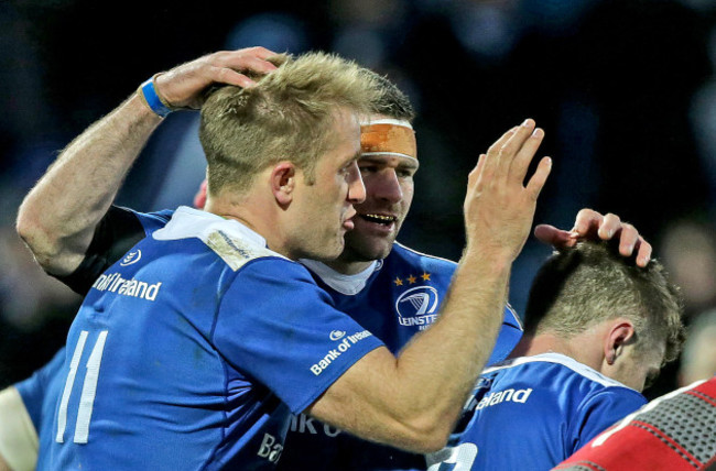 Luke Fitzgerald and Fergus McFadden congratulate try scorer Luke McGrath