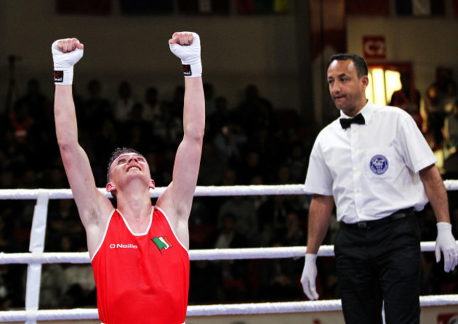 Brendan Irvine celebrates after beating Daniel Asenov