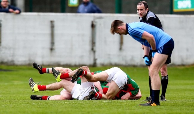 Mayo players celebrate at the final whistle