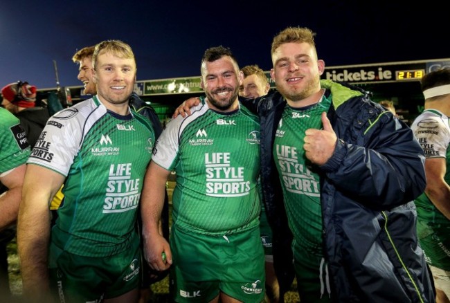 Fionn Carr, JP Cooney and Finlay Bealham celebrate at the final whistle