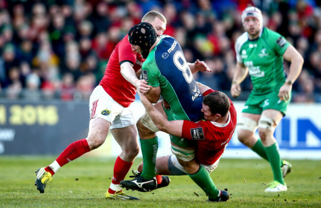 Keith Earls and Donnacha Ryan tackle John Muldoon