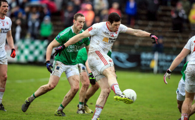 Sean Cavanagh shoots at goal