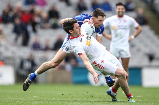 Mattie Donnelly is tackled by Killian Brady