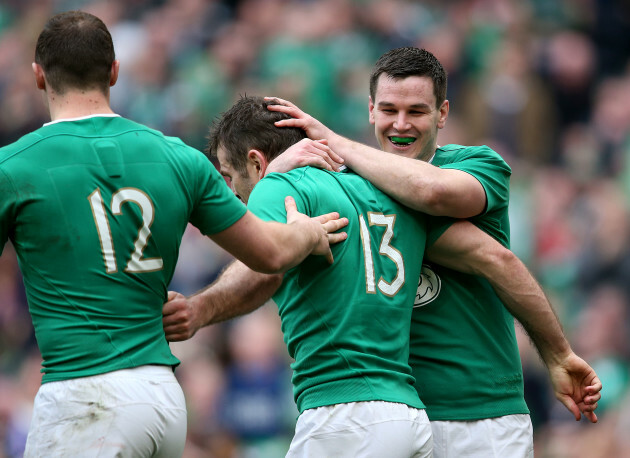 Jared Payne celebrates his try with Andrew Trimble and Jonathan Sexton