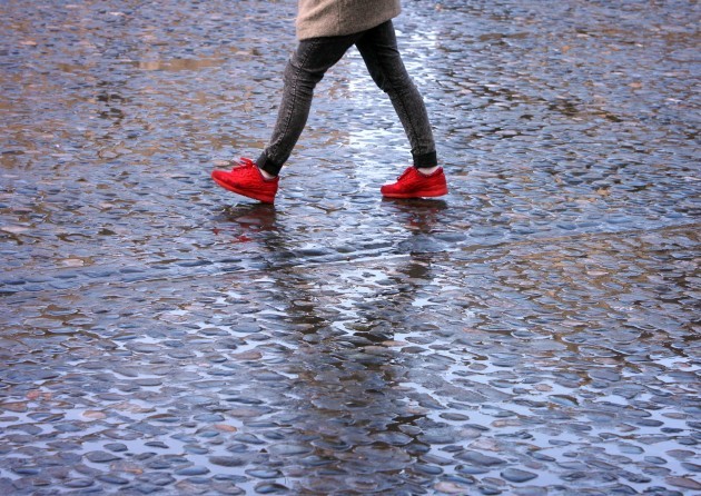 27/4/2016 Spring Rain. A pedestrian walks through