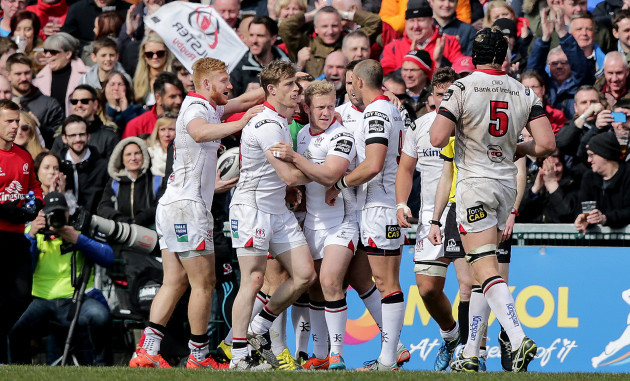 Ulster players celebrate Jared Payne's try