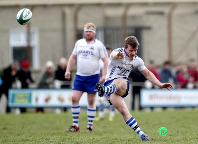 Tomas Quinlan kicks a penalty