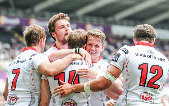 Andrew Trimble celebrates scoring his side's third try with teammates