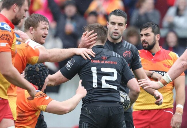 Rory Scannell celebrates his try with Conor Murray