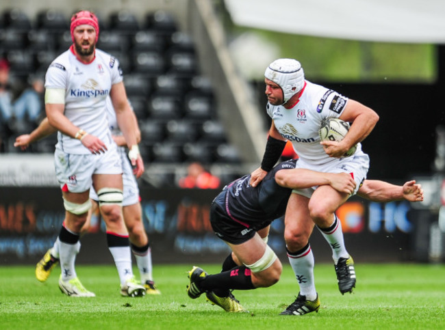 Rory Best is tackled by James King