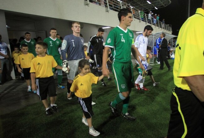 John Egan leads his team out