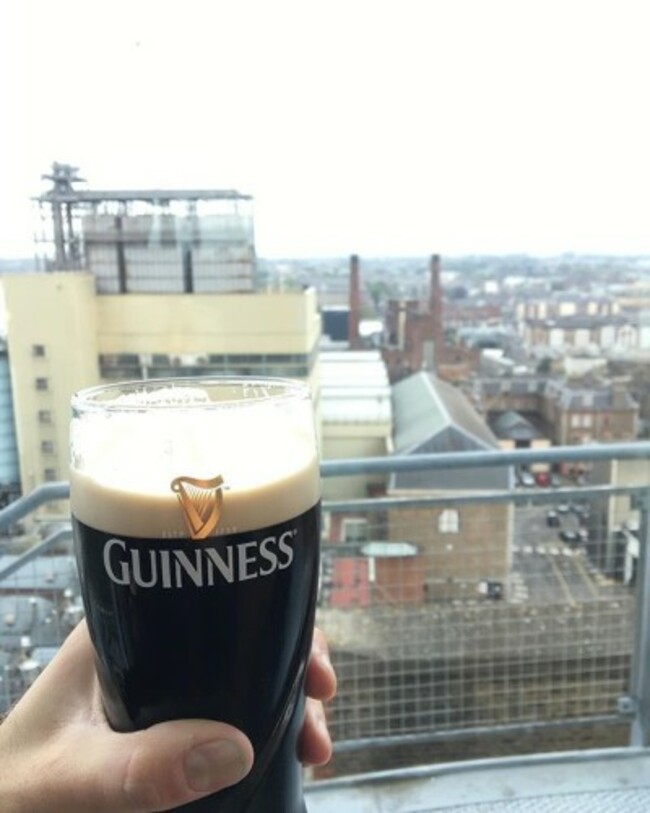 Enjoying a Guinness above the brewery #guinness #stjamesgate #guinnessstorehouse #dublin #ireland