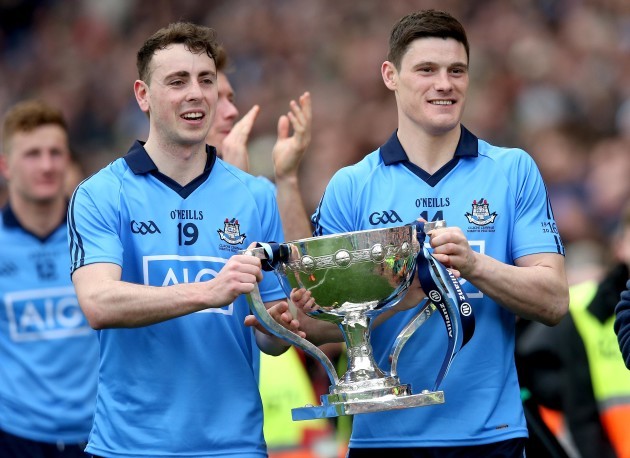 Cormac Costello and Diarmuid Connolly celebrate with the trophy