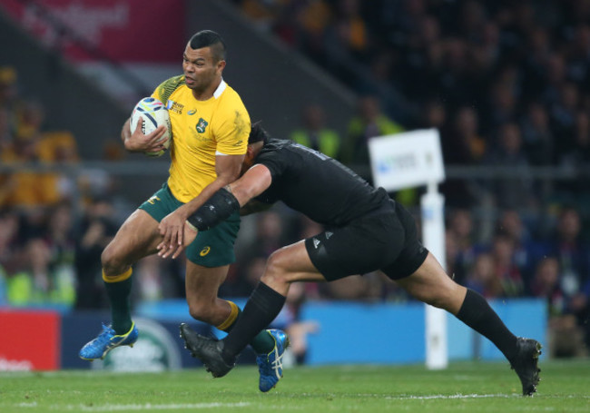 AustraliaÕs Kurtley Beale is tackled by New ZealandÕs Ma'a Nonu