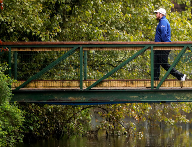 Shane Lowry makes his way to the 16th green