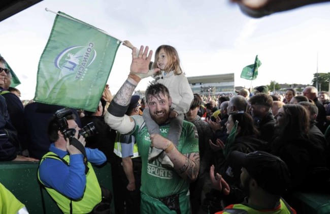 Aly Muldowney with his daughter celebrates at the end of the match