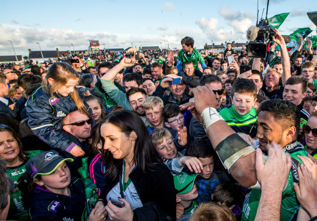 Bundee Aki surrounded by fans after the game