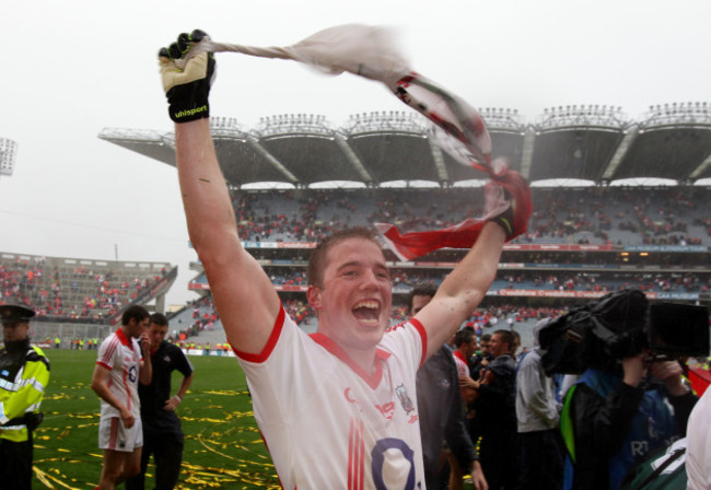 Colm O'Neill and the Cork players celebrate