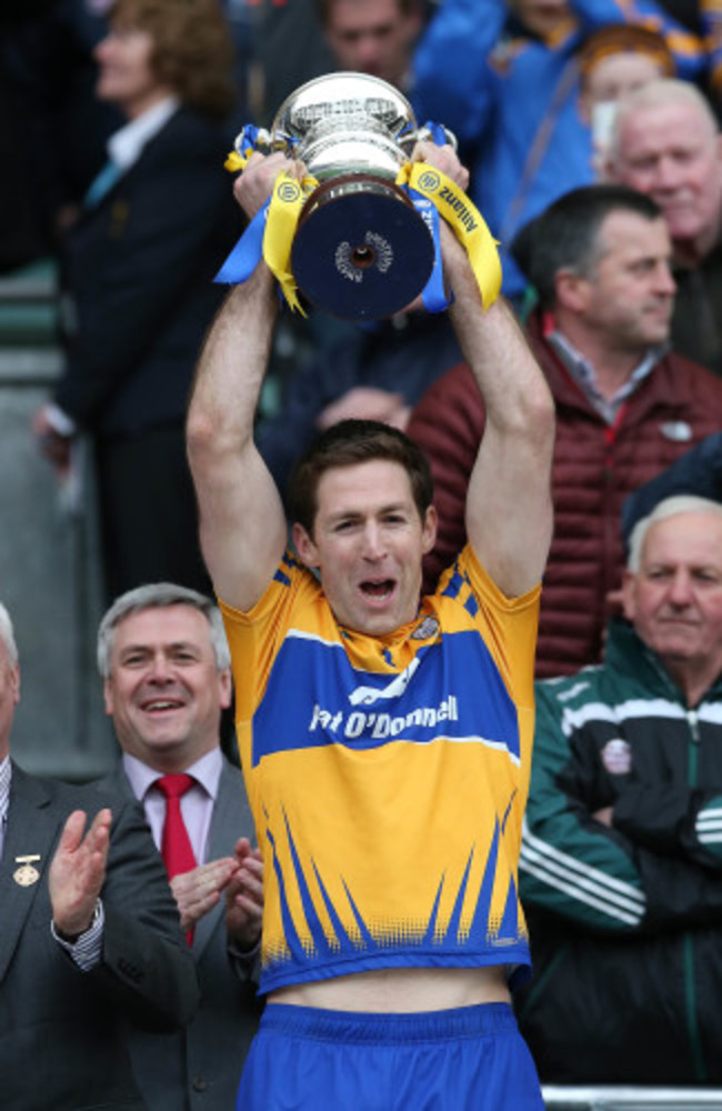 Gary Brennan lifts the cup