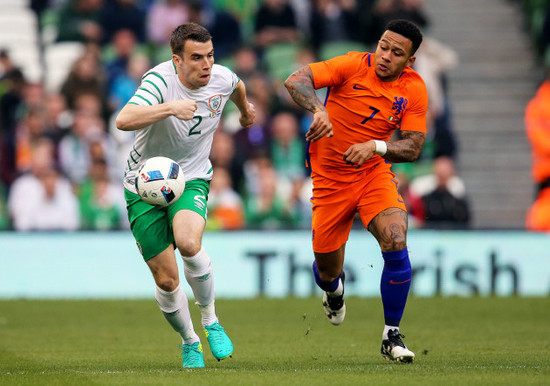 Seamus Coleman with Memphis Depay